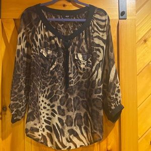 Leopard top Size XL like new condition.